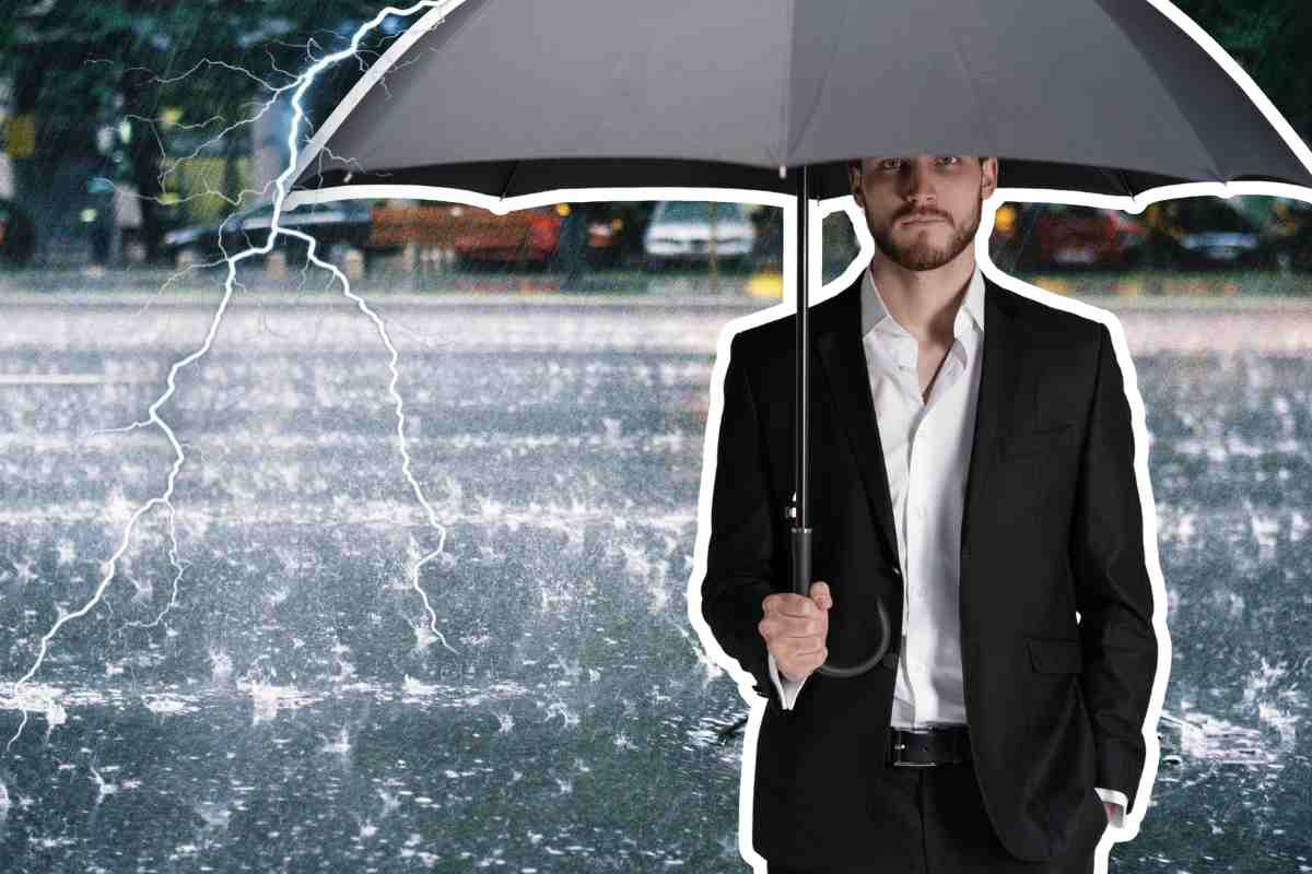uomo ombrello pioggia